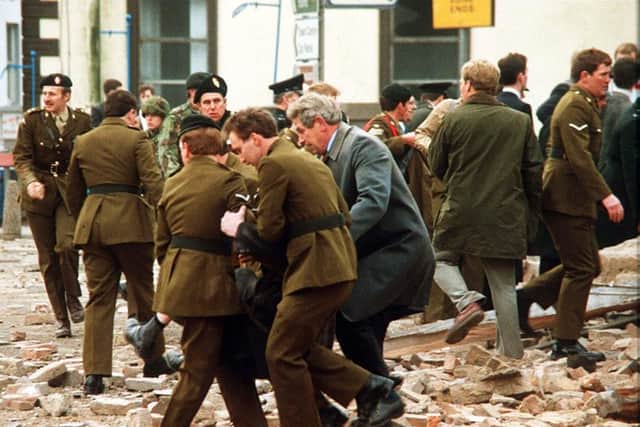 The scene of the Enniskillen bomb seconds after the blast. Picture Pacemaker