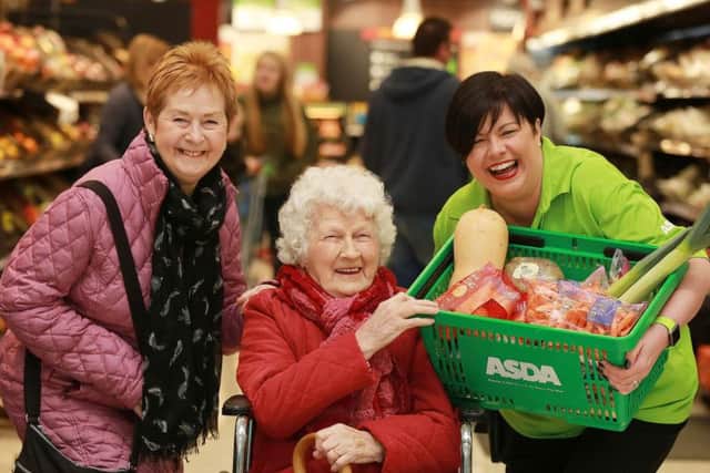 Jean McCullagh with her daughter Sheila Mills and Asda Larne Community Champion, Catherine McCallion