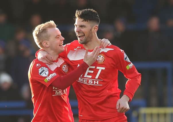 Mark Carson (left) could return this weekend for the Ports - with Adam Foley (right) aiming to continue his bright start with the club. Pic by PressEye Ltd.