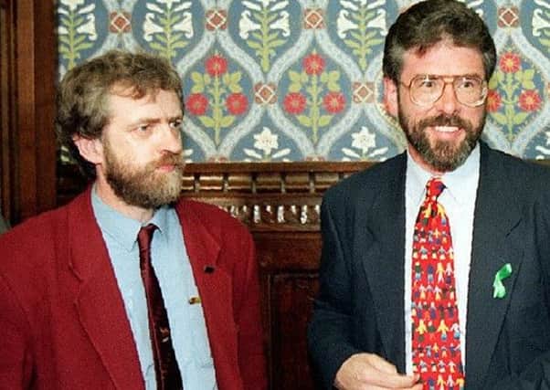 Then Labour MP and now leader Jeremy Corbyn (left) with Sinn Fein President Gerry Adams,  at the House of Commons in 1995 Photo: Louisa Buller