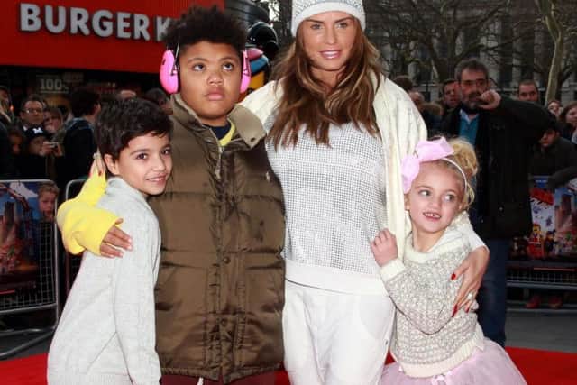 File photo dated 09/02/2014 of Katie Price with her children Junior (left), Harvey and Princess Tiaamii, as a man who sent abusive tweets about Katie Price's disabled son Harvey has apologised to her after being exposed as a troll.