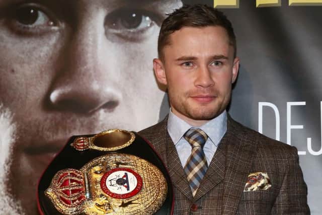 Carl Frampton with the world title belt.