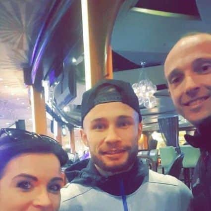 Alan Harrison and his wife Kelly meet Carl Frampton during an open training session ahead of the showdown with Santa Cruz