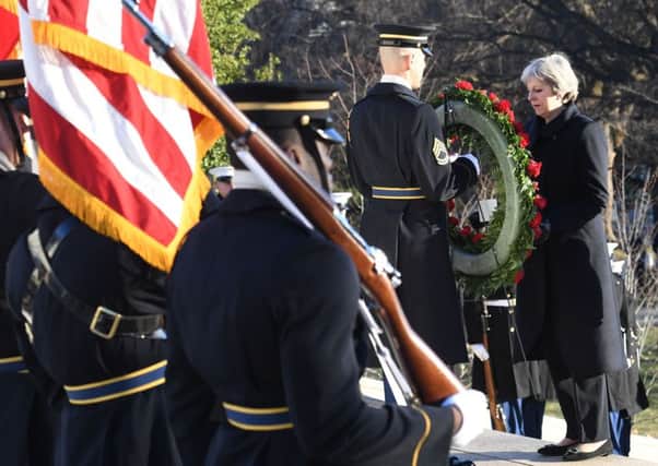 Prime Minister Theresa May lays a wreath at Arlington National Cemetery in Washington DC, USA, ahead of her meeting with President Donald Trump.She also laid a wreath at the grave of Sir John Dill, the Ulster-born general. Photo: Stefan Rousseau/PA Wire