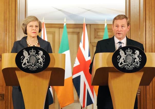 Prime Minister Theresa May with Taoiseach Enda Kenny at 10 Downing Street last July