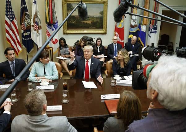 President Donald Trump speaks during a meeting with business leaders in the Roosevelt Room of the White House in Washington Monday, Jan. 30, 2017. (AP Photo/Evan Vucci)