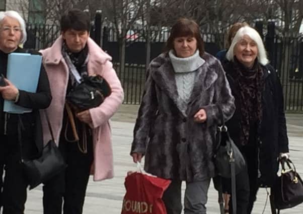 Seamus McCollum's sisters Bernadette McFall (left) and Molly Gilbert (second from right) at Laganside Courts