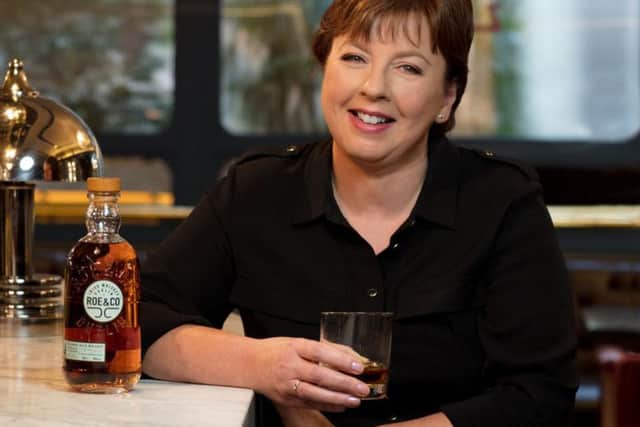 Undated handout photo issued by Diageo of master blender Caroline Martina with a bottle of Roe & Co Irish whiskey, which is to be launched by Diageo as it looks to tap into the booming popularity of the tipple