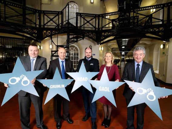 Pictured (LR) at the announcement are Phelim Devlin, Kevin Quinn and Kieran Quinn, Directors of Crumlin Road Gaol; Carol Ramsey, Director of Strategic Planning Division at Department for Infrastructure and John McGrillen, Tourism NI Chief Executive.