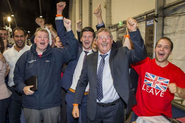 DUP MLA Sammy Wilson (second from right) celebrates last June with Leave supporters at the Titanic Exhibition Centre, Belfast, after the Leave campaign claimed victory in the EU referendum. Photo: Liam McBurney/PA Wire