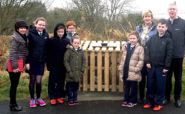 Pictured at one of the newly installed bins are pupils from St Canice's Primary School in Feeny, Eco-Schools Co-Ordinator Mrs Joanne Mooney, the Mayor of Causeway Coast and Glens Borough Council Alderman Maura Hickey and Waste Management Officer John McCarron.