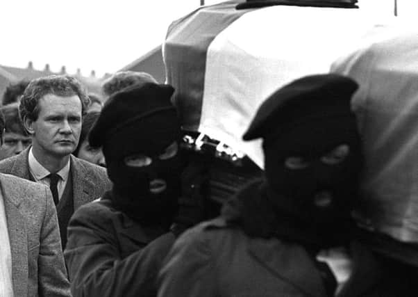 Martin McGuinness (left) follows the coffin of IRA man Charles English in Londonderry in 1984. Pic: Pacemaker