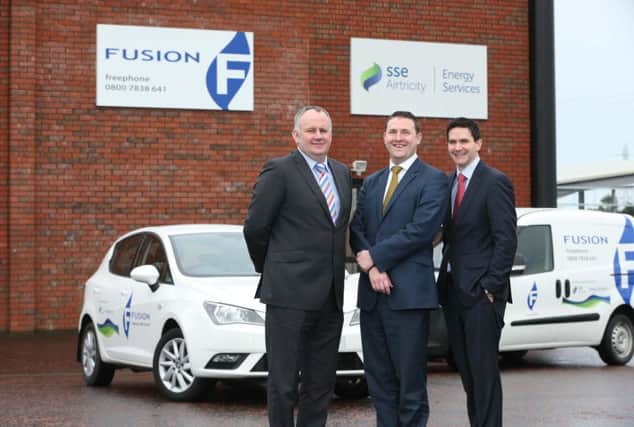 Bill Cherry of Fusion Heating pictured with Brian Connolly and David Manning of SSE Airtricity