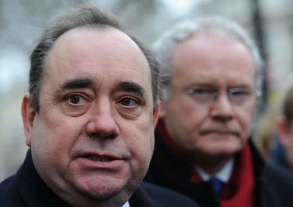 Then Scottish First Minister Alex Salmond and then Deputy First Minister Martin McGuinness emerge from the Cabinet Office in London after they met to discuss a joint declaration they issued to the UK government on the economy, in February 2011. Pic: PA