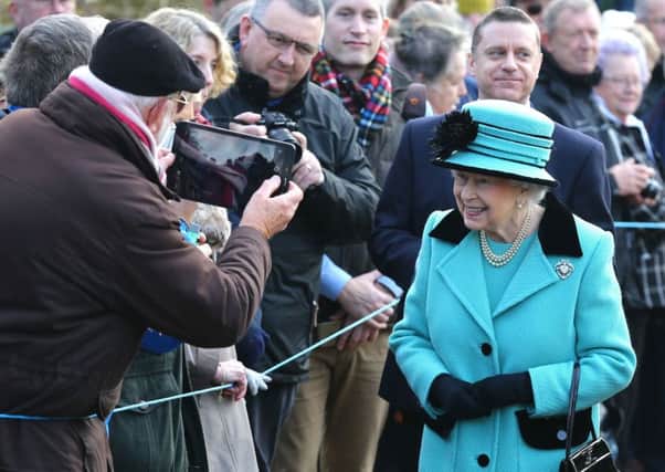 The Queen during a walkabout after a church service at St Peter and St Paul West Newton in Norfolk on Sunday