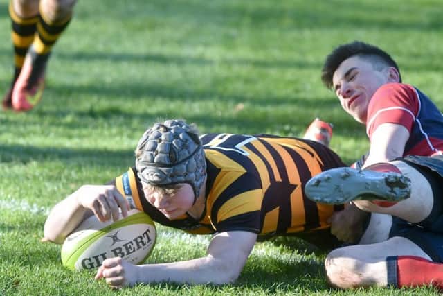 .
RBAI's Connor mcCormick touches down for another home try