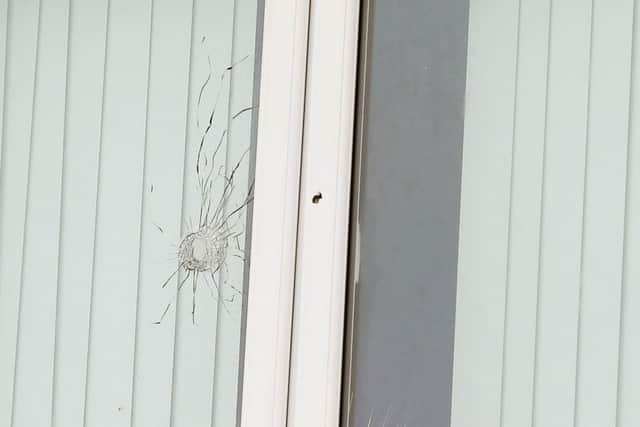 A damaged window at the property on Bawnmore Drive in Newtownabbey. Picture by Jonathan Porter/PressEye.com