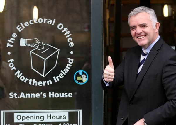 Former DUP minister Jonathan Bell arrives at the Electoral Office in Belfast