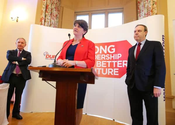 DUP deputy leader, Nigel Dodds, right, as party leader Arlene Foster speaks at the launch of the party's Assembly election campaign launch. DUP chair Lord Morrow is left at Brownlow House.

Photo: Kelvin Boyes / Press Eye