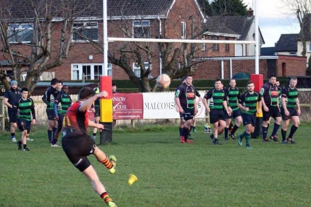 Jordan slots over one of his 11 kicks against Monaghan