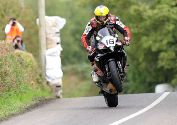 Former racer John Burrows, who now runs the Cookstown B.E. Racing team, says swift action must be taken to safeguard the future of Irish National road racing.