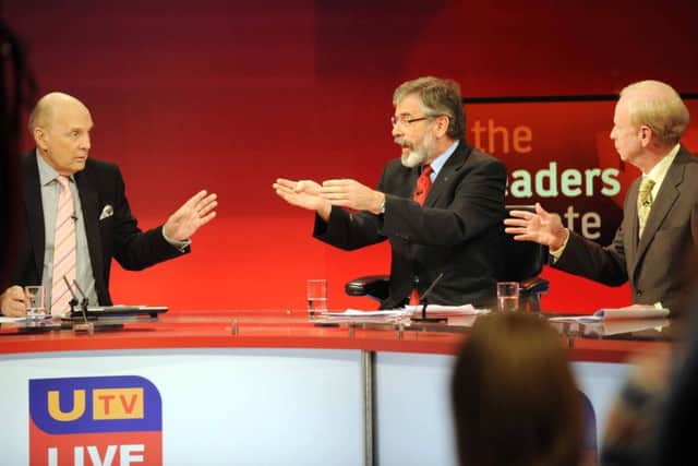 Reg Empey, right, in debate with Gerry Adams of Sinn Fein in a 2010 UTV election debate chaired by Jim Dougal left. 
Picture by Stephen Davison