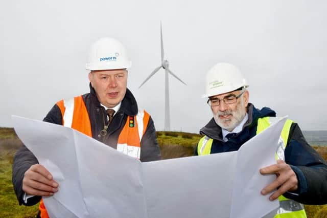 Stephen McCully, Managing Director of Power NI and Philip Rainey, Chief Executive of Simple Power are pictured in Ballyclare at one of several 250kW wind turbines projects completed in recent months.  The turbines are empowering Northern Ireland with clean, green renewable energy.