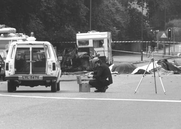 A police photographer at the scene of the Hyde Park bombing in 1982