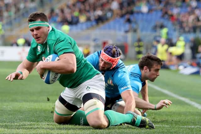 Ireland's CJ Stander scores the first of his three tries against Italy