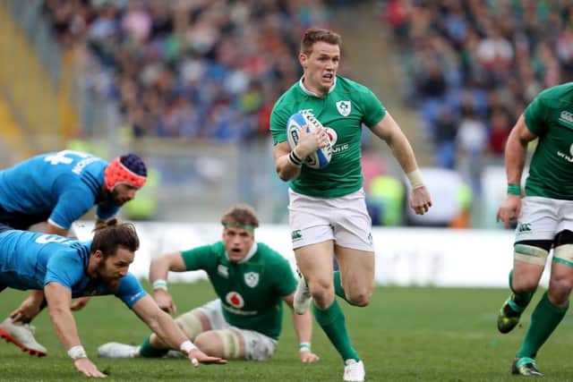 Ireland's Craig Gilroy scores one of his three tries against Italy