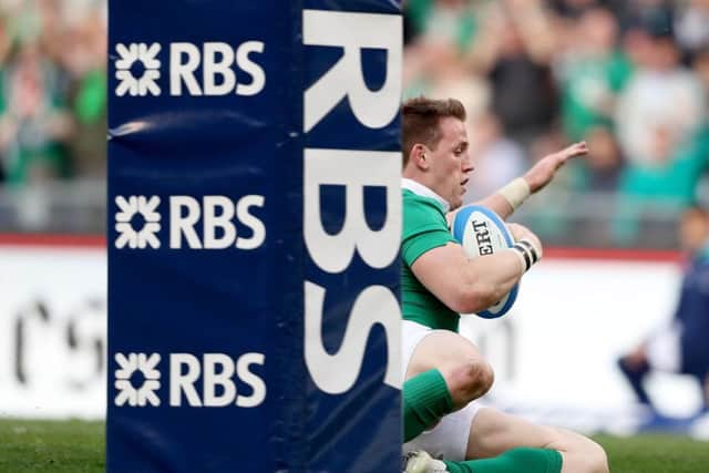 Ireland's Craig Gilroy scores his third try against Italy
