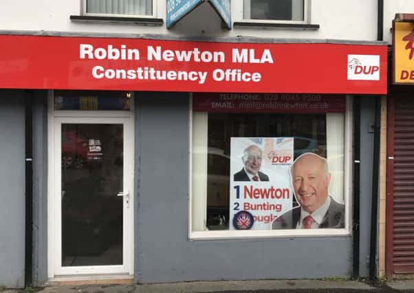 The posters have been prominently displayed in the window of Mr Newtons taxpayer-funded office  in breach of Assembly rules