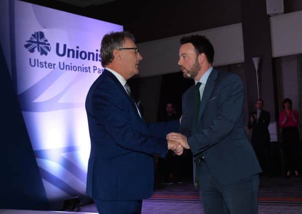 SDLP leader Colum Eastwood with UUP leader Mike Nesbitt at the Ulster Unionist Party conference at the Ramada Hotel in Belfast last year. 
Photo Colm Lenaghan/Pacemaker Press