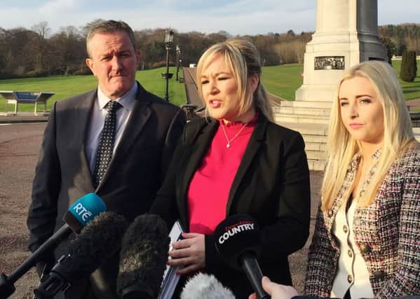 (Left-right) Sinn Fein's Conor Murphy, Michelle O'Neill and Orlaithi Flynn address the media on Stormont estate in Belfast