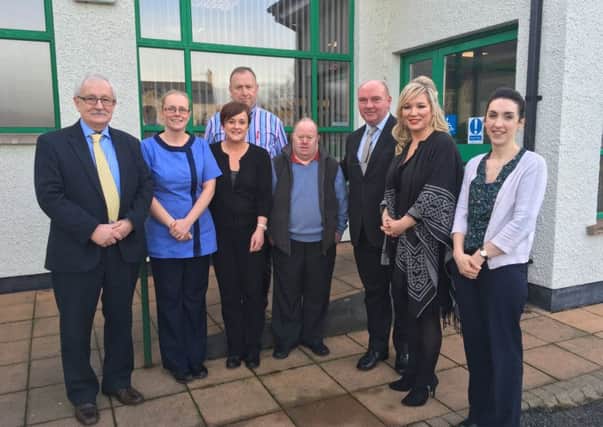 Health Minister Michelle O'Neill and Sinn Fein representative Oliver McMullan with doctors and staff of the Glens of Antrim GP practice in Cushendall during a visit last November. The Cushendall practice is opening a branch service in Carnlough to cater for Glenarm and Carnlough patients.
