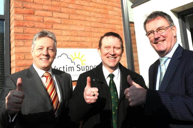 Unionist unity: Then DUP and Ulster Unionist leaders Peter Robinson and Mike Nesbitt at the Ballymena Electoral office with, centre, agreed candidate Nigel Lutton for the Mid Ulster by-election in 2013. Pic Colm Lenaghan/Pacemaker
