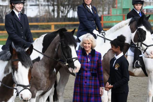 The Duchess of Cornwall, President of the Ebony Horse Club, visits the charity's Brixton riding centre to celebrate the club's 21st anniversary
