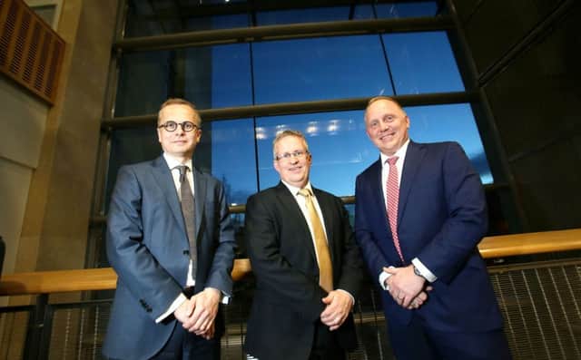 Pictured at the launch are, from left, Andrew Brammer of Allen & Overy Belfast with Ulster University vice-chancellor Professor Paddy Nixon and Jason Marty, executive director of Backer McKenzie Belfast