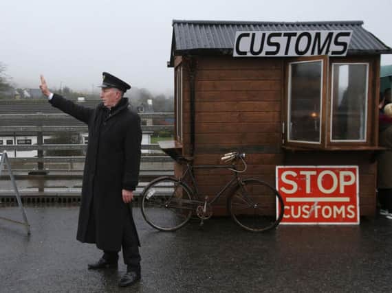 A mock customs post set up at Ravensdale, Co Louth, as anti-Brexit campaigners hold a go-slow protest on the main road between Northern Ireland and the Republic of Ireland.