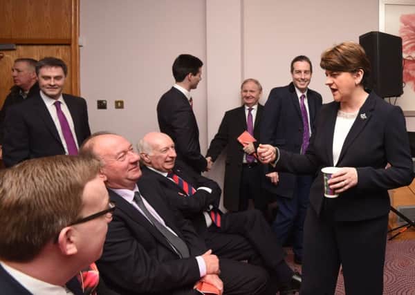 Arlene Foster chatting to Robin Newton and William Irwin at the event. Photo Colm Lenaghan/Pacemaker Press