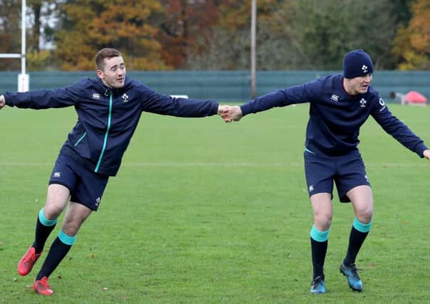 WHOSE PULLING WHO: Paddy Jackson(centre) and Jonny Sexton