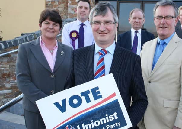 Unionist unity: Tom Elliott at the launch of his Westminster campaign in 2015 with DUP leader Arlene Foster, left, Ulster Unionist leader Mike Nesbitt, right, and in the background, Fred Parkinson and Lord Morrow MLA.  Photo by Andrew Paton/Presseye.com