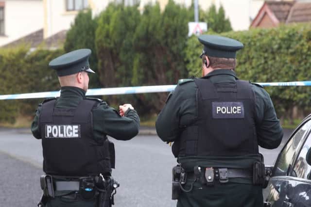 Police officers at the scene .  Photo Lorcan Doherty