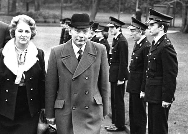 Chief Constable Sir Kenneth Newman leaving police HQ for the last time with his wife Lady Eileen Newman, 22/12/1979.