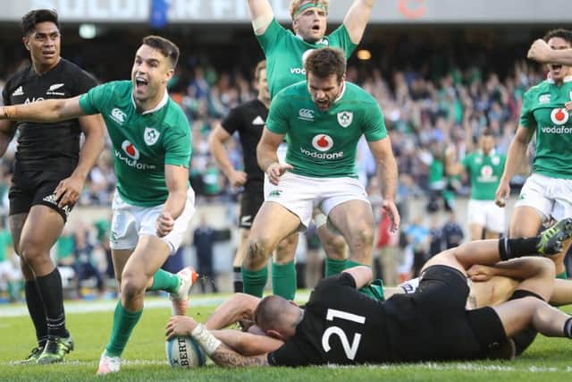 Ireland's Conor Murray celebrates Robbie Henshaw's try Â©INPHO/Billy Stickland