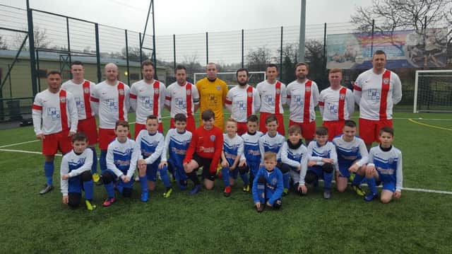 The Banbridge Rangers first team squad with the club's Under 12s on Saturday. Both teams recorded emphatic victories last weekend.