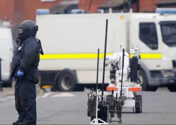 A bomb disposal expert dressed in protective equipment at a security alert in Belfast in March, 2016. Picture by Kevin Scott/Presseye