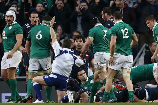 Ireland's Conor Murray scores a try against France
