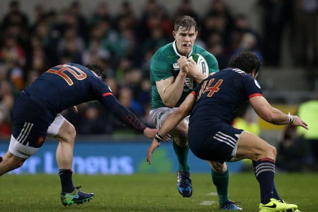 Ireland Andrew Trimble tackled by  France Henry Chavancy and Yoann Huget
