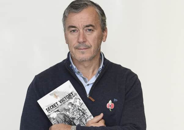 Author William Matchett with his book 'Secret Victory.
' Photo: Colm Lenaghan/Pacemaker Press
